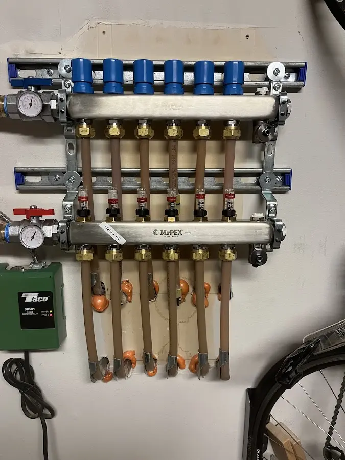 Plumber performing Gas Line Installation at a residential property in Glasgow